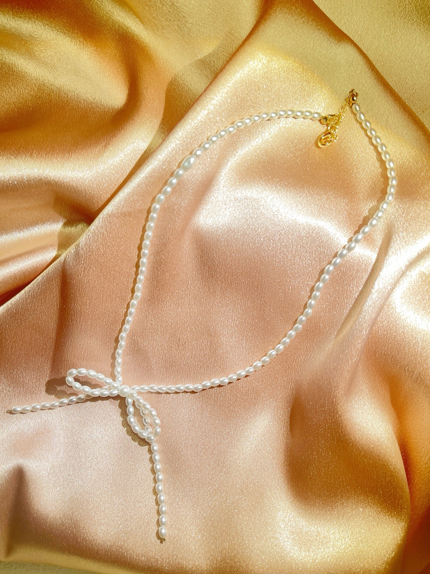 Collier Nœud de Papillon en Perles - Aurore Studio