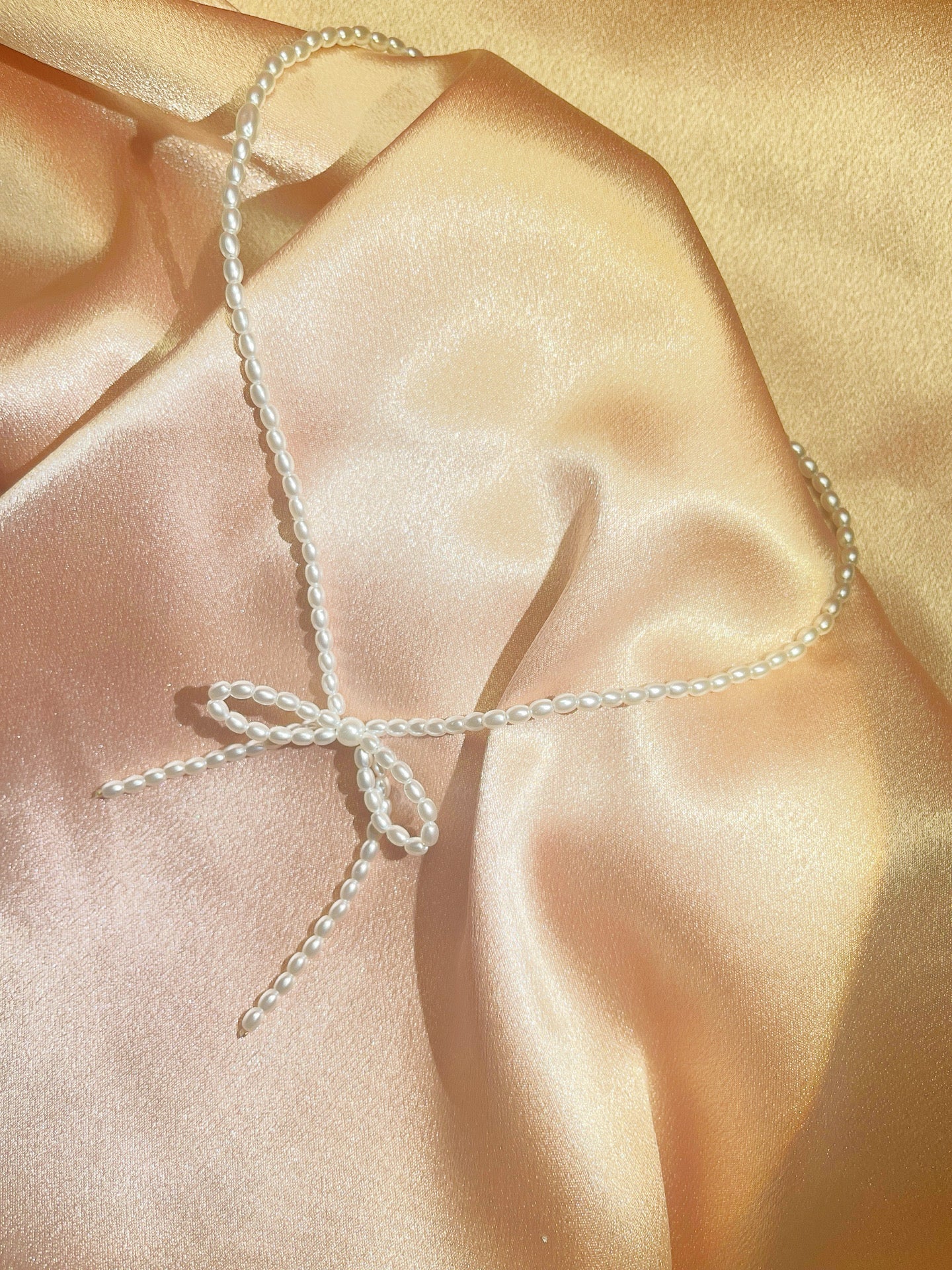 Collier Nœud de Papillon en Perles - Aurore Studio