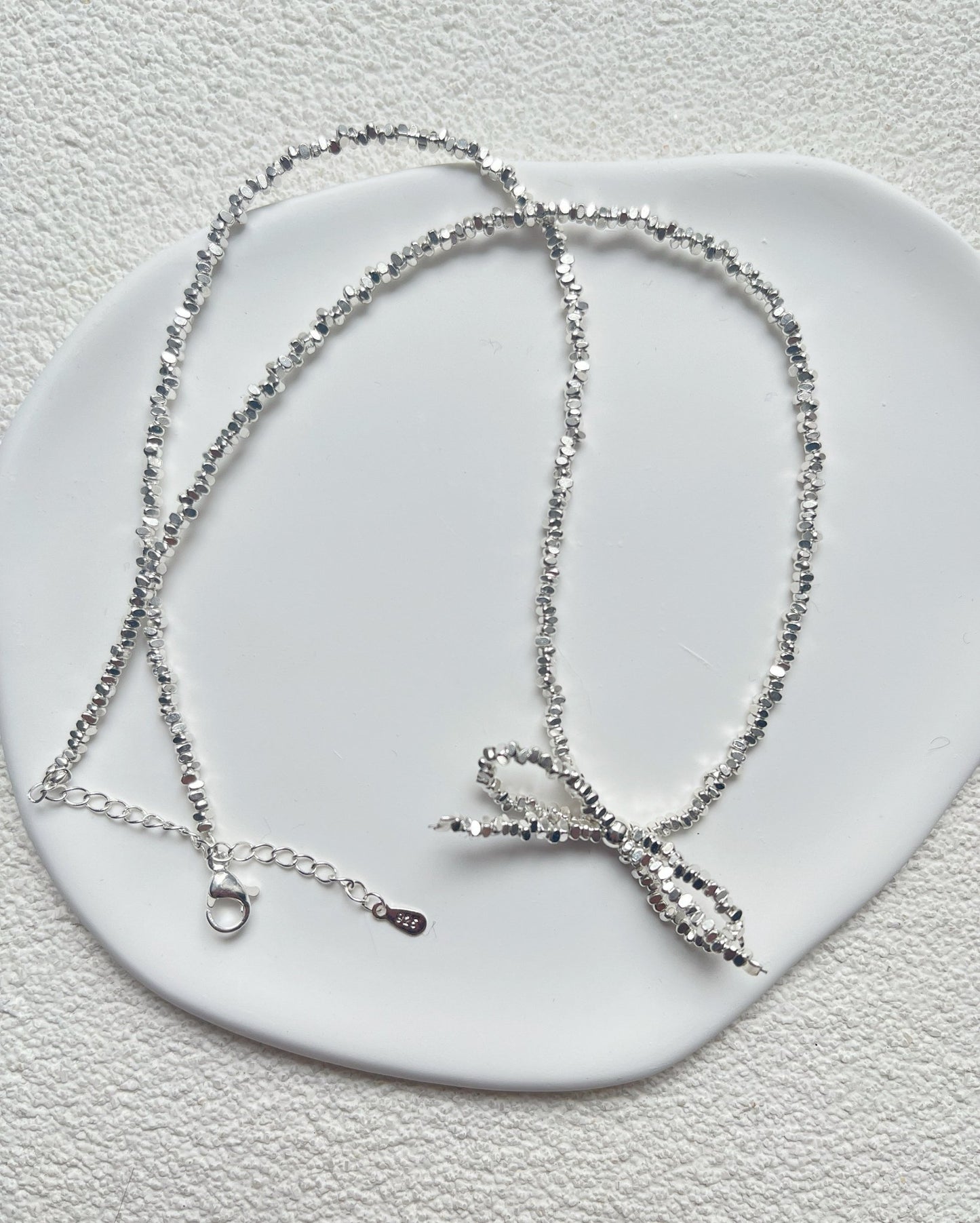 Collier Ras de Cou Noeud Papillon Argenté - Aurore Studio