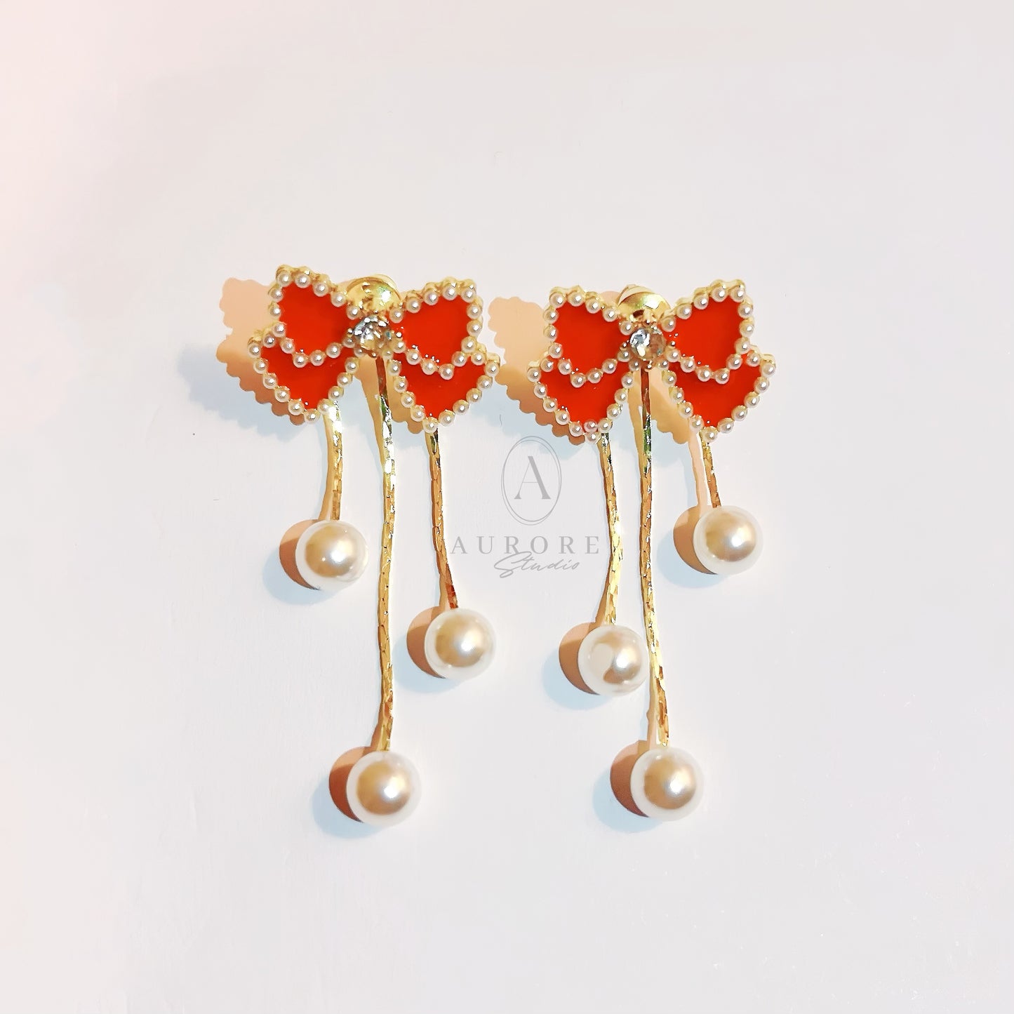 Boucles d'Oreilles Nœud Papillon Rouge et Perles