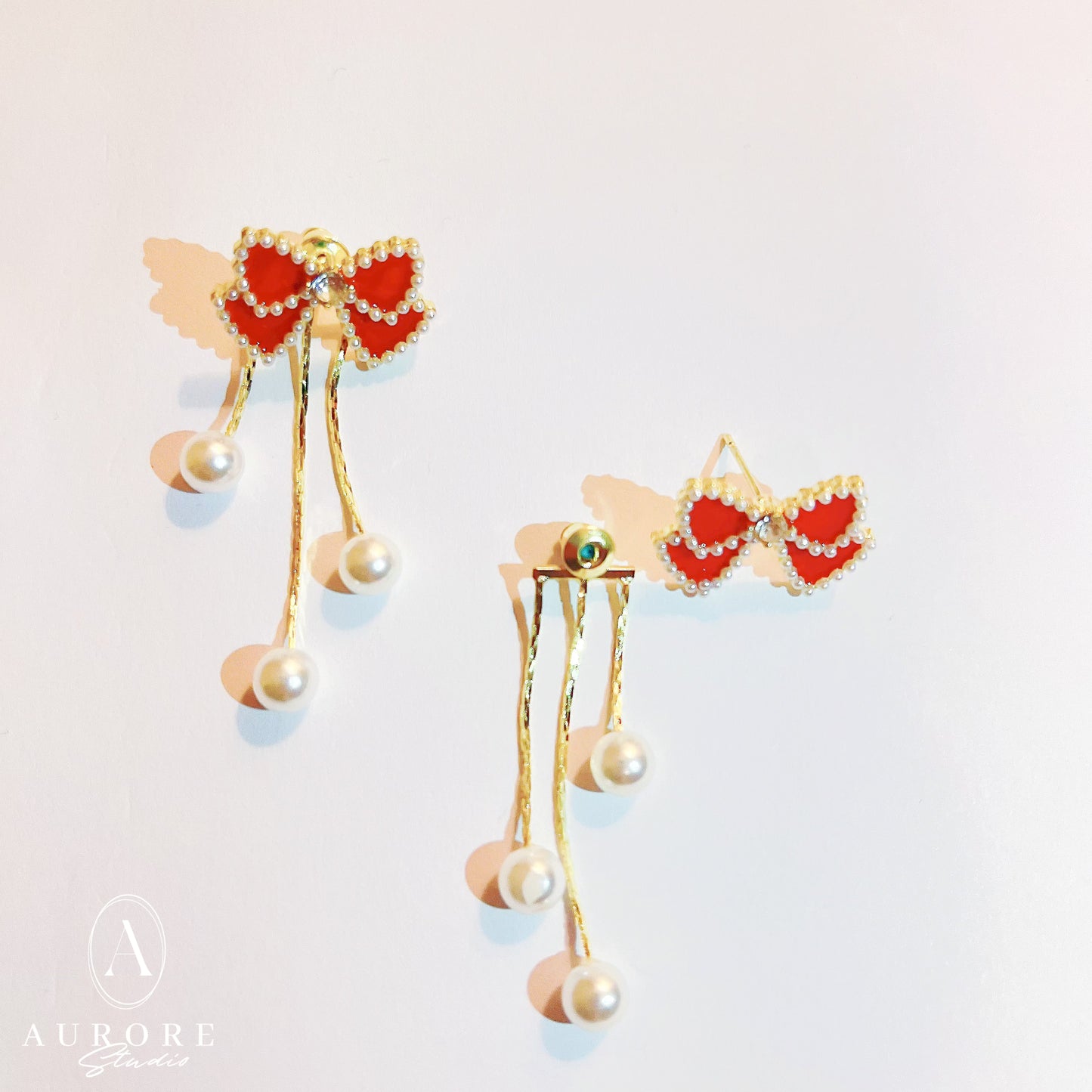 Boucles d'Oreilles Nœud Papillon Rouge et Perles