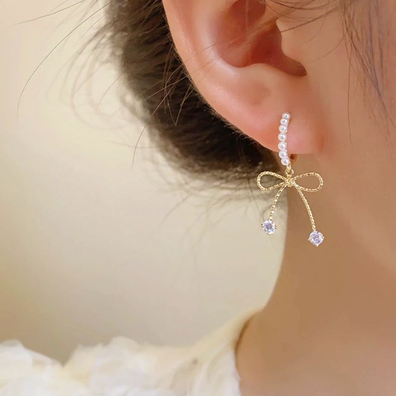 Boucles d'Oreilles Noeud Papillon Perles & brillants