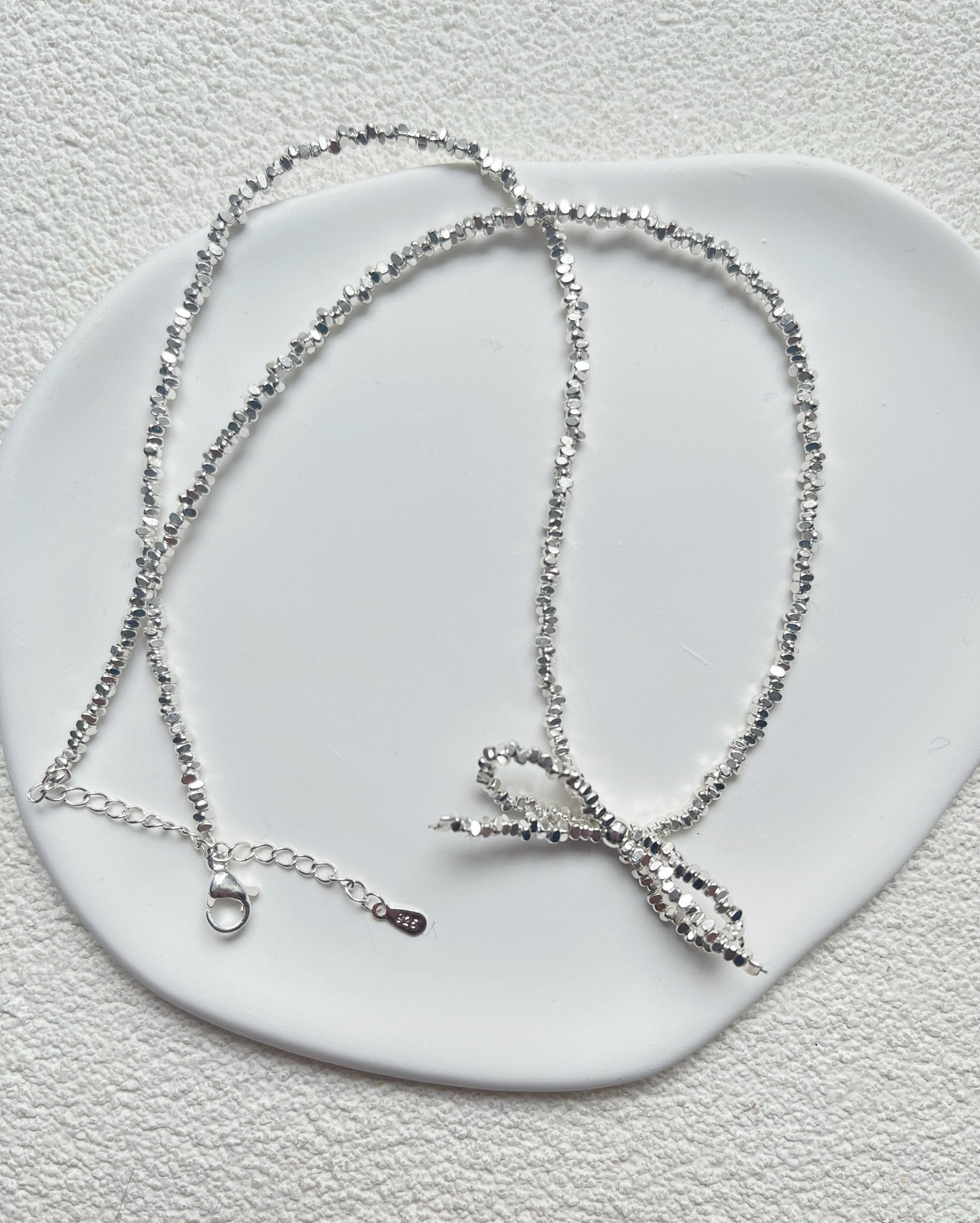 Collier Ras de Cou Noeud Papillon Argenté - Aurore Studio